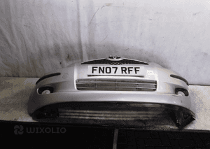 Zderzak przód przedni toyota yaris 2 ii 1E7 srebrny halogeny 1
