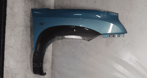 Hyundai Tucson I 1 błotnik PRAWY  przedni przód MORSKI KOLOR HE 1