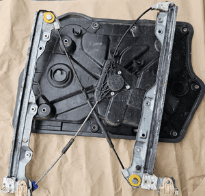 Renault Koleos I podnośnik szyby przód przedni lewy