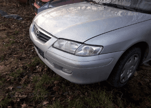 Mazda 626 GF 97-02 błotnik przedni przód Prawy Lewy w lampa szyba  kolor 9
