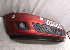 Zderzak przód przedni ford fiesta MK6 vi lift fl T5 rudy pomarańczowy halogeny 4