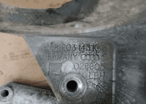 Łapa mocowanie alternatora VW Passat B5 06B903143K 5