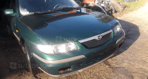Mazda 626 GF GW 97-02   Maska lampa zderzak pas atrapa 18G 22V 2