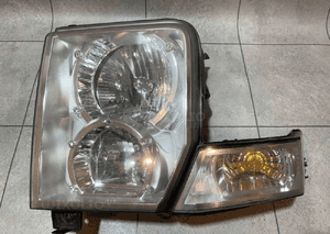 JEEP COMMANDER XK XH LAMPA LEWA ORYGINAŁ UK BDB 8
