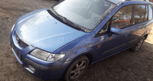Mazda Premacy Maska lampa zderzak pas atrapa 4Y 2
