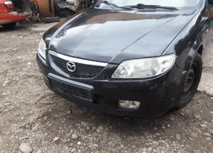 Mazda 323 323f BJ 01-03 Lift  Maska lampa zderzak pas atrapa 22V 9