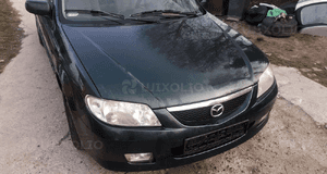 Mazda 323 323f BJ 98-03 Lift  Maska lampa zderzak pas atrapa 18J 1