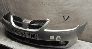 Zderzak przód przedni nissan almera N16 lift fl KY0 srebrny halogeny 2