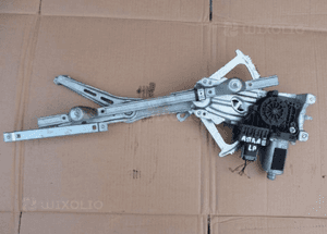 MECHANIZM OPUSZCZANIA SZYBY LEWY PRZOD ASTRA III