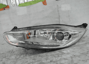 Ford fiesta MK7 lift soczewka lampa przód lewa przednia 1