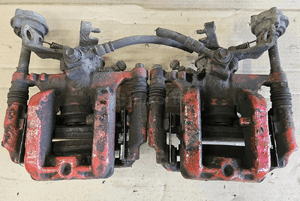Opel Astra J 4 IV zacisk hamulcowy tył tylny prawy lewy 1