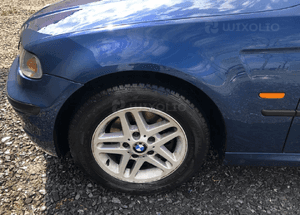 Blotnik lewy przod bmw E46 compact mysticblau 1