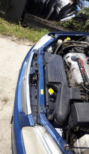 Mazda 323 323f BJ 98-00  Maska lampa zderzak pas atrapa 22V 5