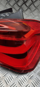 BMW F20 F21 LAMPA PRAWA TYŁ TYLNA W BŁOTNIK 7359018 7