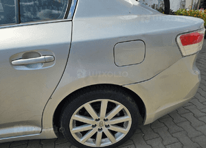 Toyota Avensis T27 sedan błotnik tył tylny prawy lewy 1F7 1