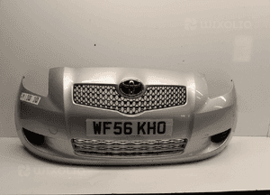 } ZDERZAK PRZÓD PRZEDNI TOYOTA YARIS 2 II 1E7 SREBRNY 1