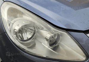 Opel Corsa D lampa przód przednia prawa lewa EU 5