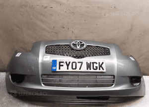 Zderzak przód przedni do toyota yaris ii 2 1F8 szary 1
