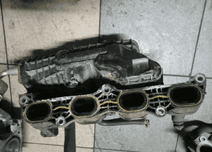 kolektor ssący suzuki 1.5 m15a 2