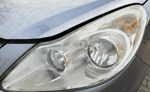 Opel Corsa D lampa przód przednia prawa lewa EU 4