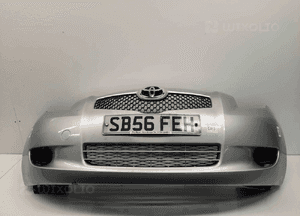 Zderzak przód przedni toyota yaris 2 ii 1E7 srebrny 1