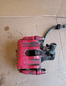 Zacisk hamulcowy lewy tył tylny lewy Ford Focus MK2 2