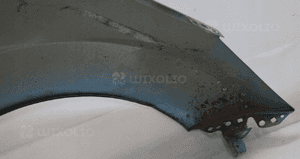 Błotnik przedni lewy ford fiesta MK7 99 11