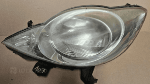 Peugeot 107 lampa przód przednia lewa EU 1