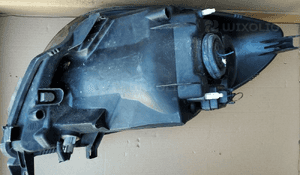Nissan Note E11 07 lampa przod przednia  lewa 4