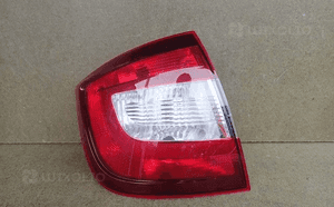 Lampa lewa tylna tył skoda rapid lift liftback 5J 1