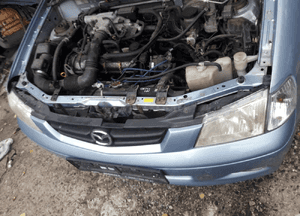 Mazda Demio  99-03 LIFT Maska lampa zderzak pas atrapa 5