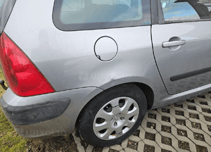 Peugeot 307 blotnik tyl tylny lewy prawy  SW kombi 1