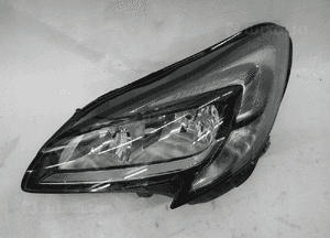 Opel corsa lampa przednia lewa 1