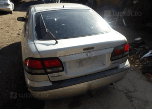 Mazda 626 GF 97-02 Zderzak tył tylny 18J 11Q 1