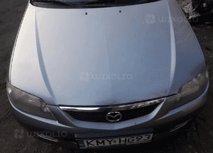 Mazda 323 323f BJ 01-03 Lift  Maska lampa zderzak pas atrapa 22V 4