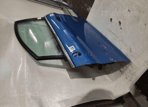Drzwi przód przednie lewe ford fiesta MK.7 7 vii 99 błękitne niebieskie 5D 5 drzwi hb 4