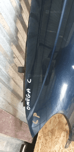 Błotnik lewy przód przedni Opel Omega C 5