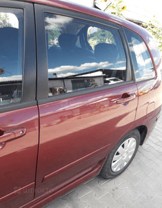 Suzuki Liana drzwi tyl lewe lift ZY8 1