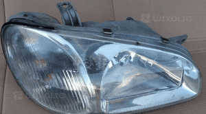 Kia Carnival reflektor lampa przod przednia prawa 1