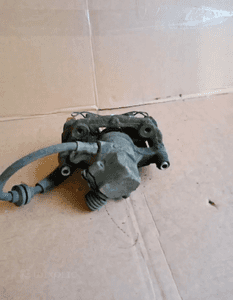 Zacisk hamulcowy lewy tył tylny lewy Ford Focus MK2 6