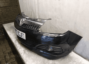 Zderzak przód przedni do opel astra h 3 iii gtc halogeny kod lakieru Z20R czarny 2