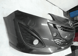 Mazda 5 lift 2010- z kratkami cały zderzak przedni 2