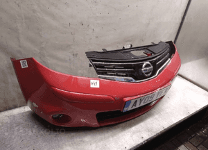 Nissan note E11 lift 09-12 zderzak Z10G czerwony 2
