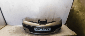 Zderzak przód przedni do nissan note E11 C30G złoty halogeny 1