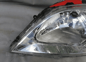 Lampa lewa lewy przód Dacia Logan lift  8200744753 2