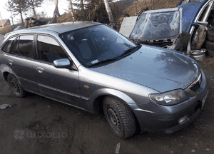 Mazda 323 323f BJ 01-03 Lift  Maska lampa zderzak pas atrapa 22V 2