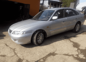 Mazda 626 GF GW 97-02   Maska lampa zderzak pas atrapa 18G 22V 8