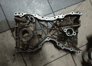 obudowa rozrządu suzuki 1.5 16v m15a 2