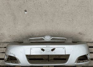 Zderzak przód przedni toyota corolla ix 9 E12 lift fl 52119-02510 cały 1