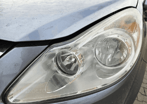 Opel Corsa D lampa przód przednia prawa lewa EU 2